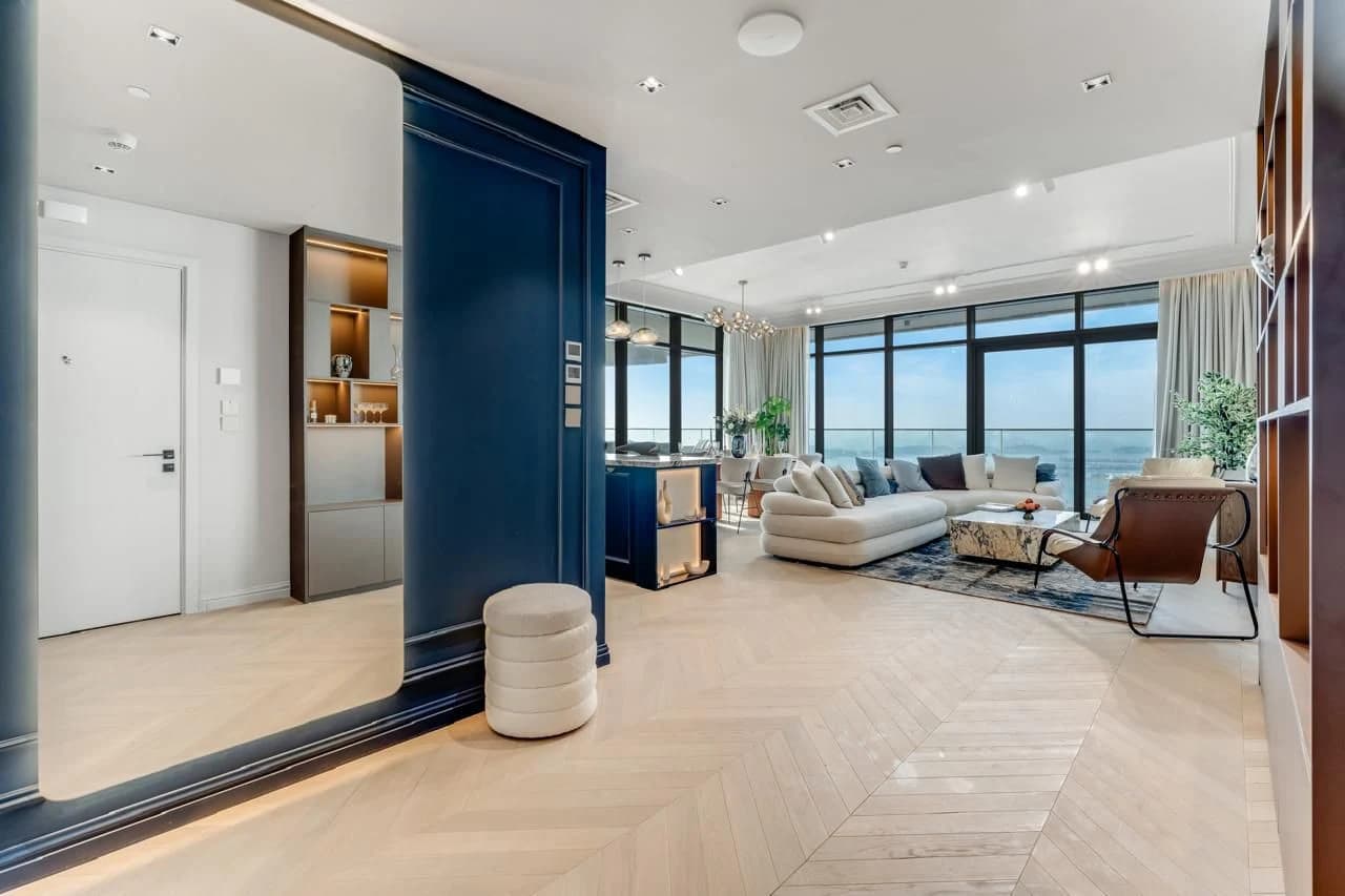 A light-filled property interior overlooking the sea